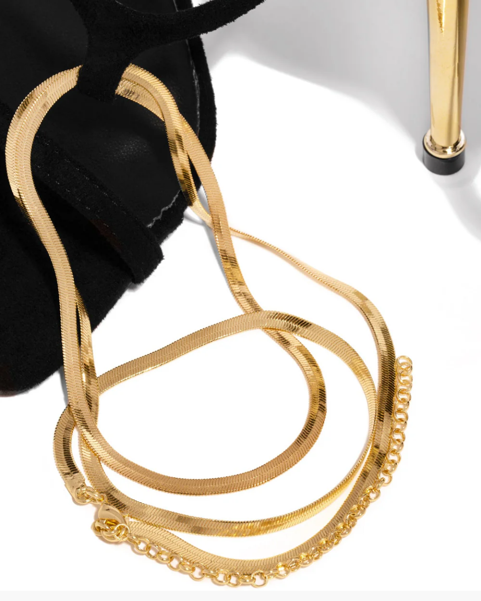 Adrienne – Gold-tone hardware – Ankle chain stiletto heels