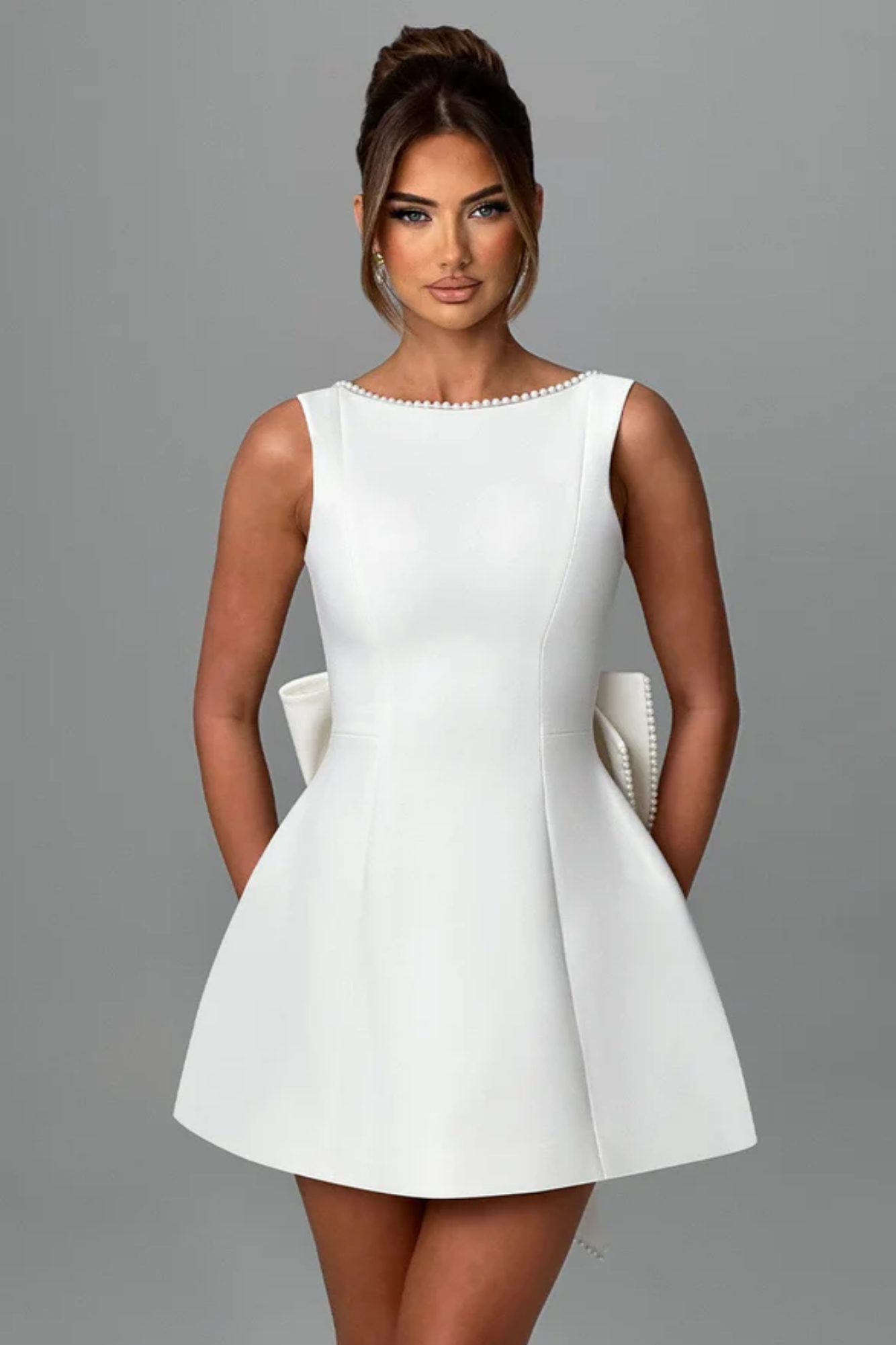 Bruna – Pearl bow detail – Mini dress