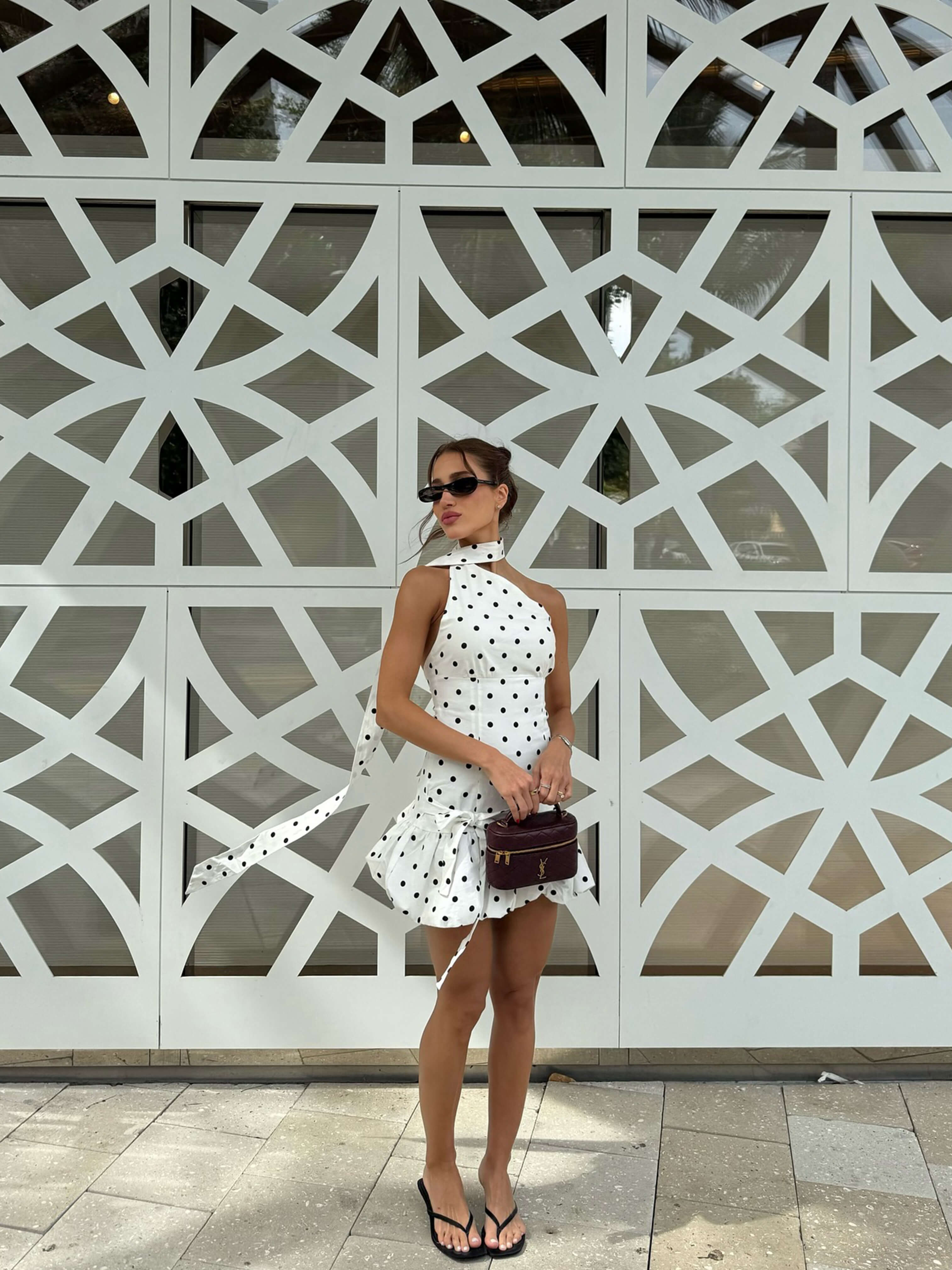 Lunetta – Asymmetric cut – Polka dot mini dress